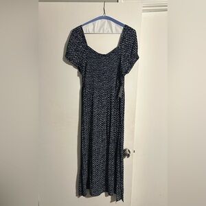 Made by Ripcurl , size is an XL , and is navy blue and white